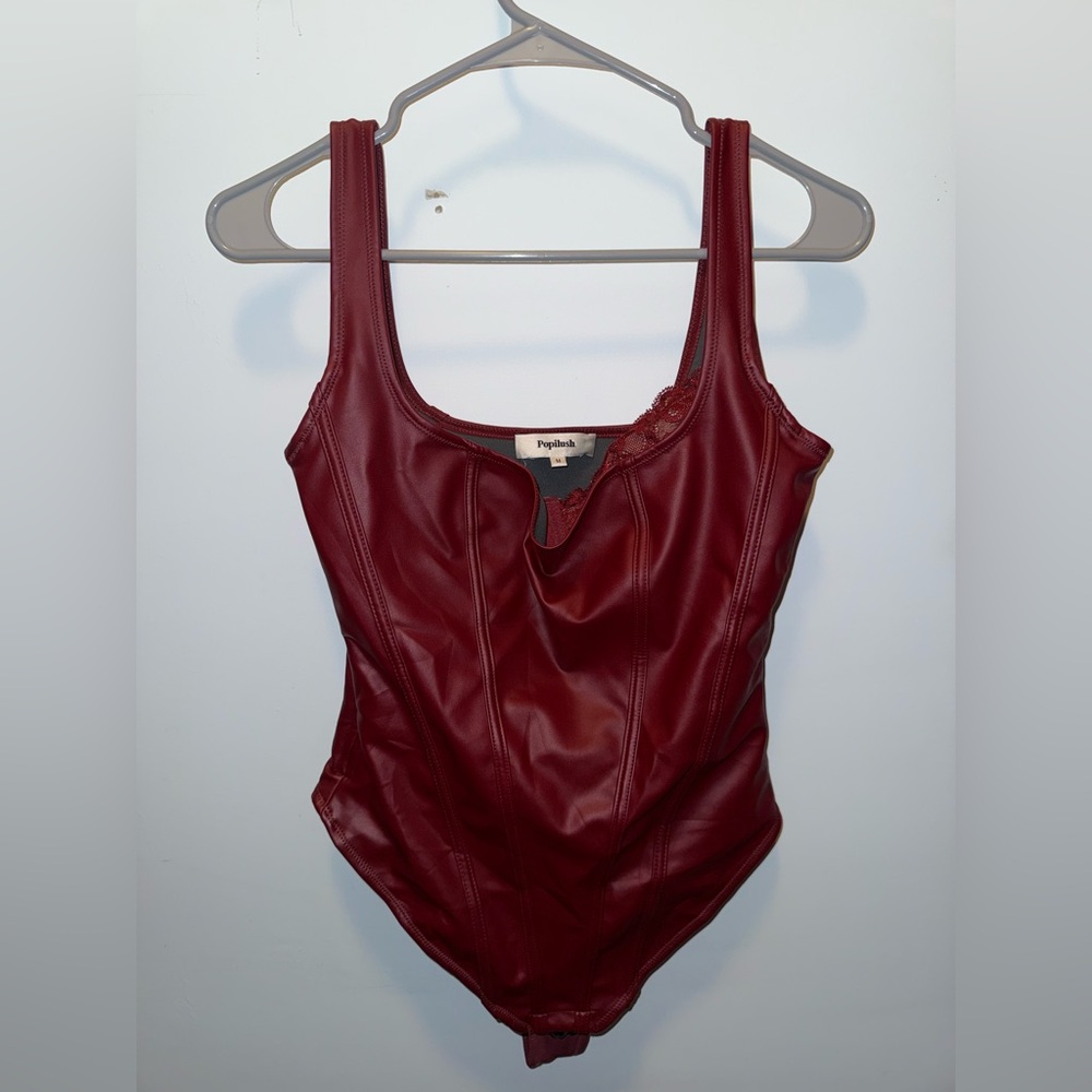 NWOT Red/Maroon body suit with lace bra insert